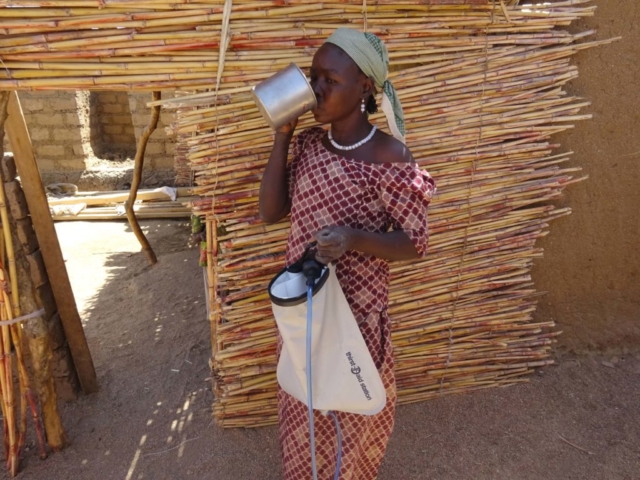 Maïramu enjoys a glass of safe clean freshly filtered water