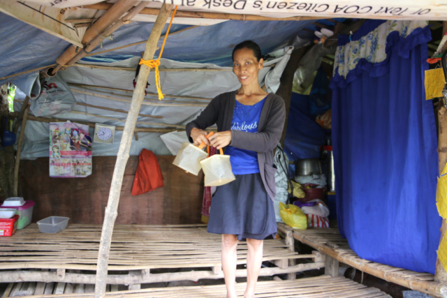 Solidad from the Philippines shows off her solar lights