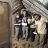 Ashish Chaulagain, looking inside a shelter using the tools etc from ShelterBox.