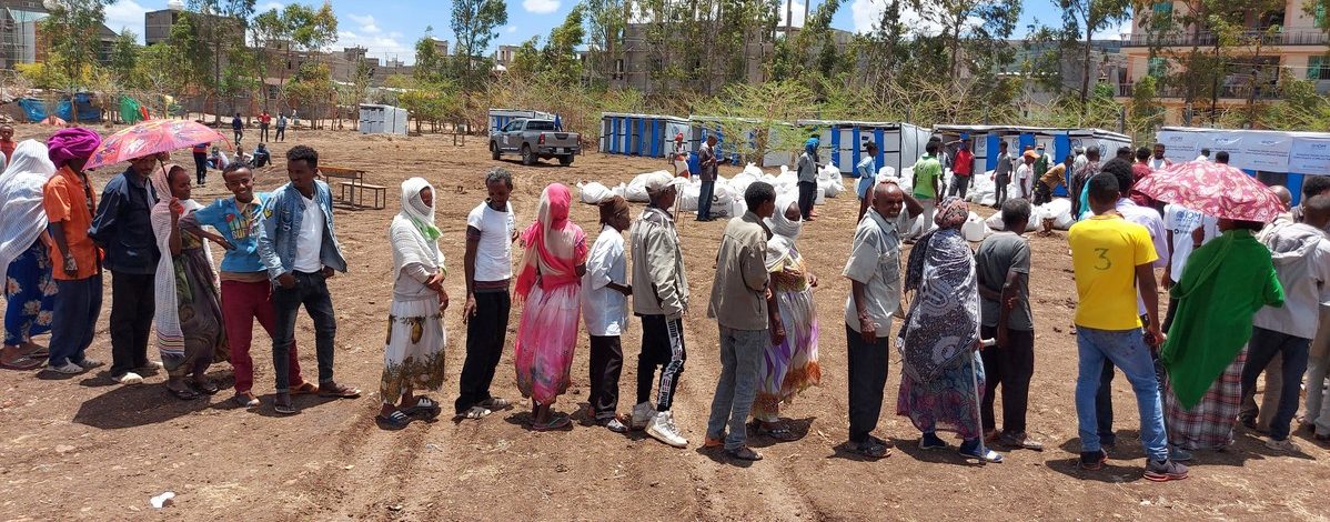 Families in Ethiopia line up to receive ShelterBox aid