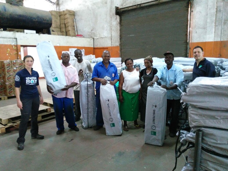 ShelterBox volunteers getting ShelterKits ready to be shipped.