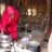 A woman looking down using her kitchen set