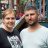 Ukrainian husband and wife stand in damaged playground